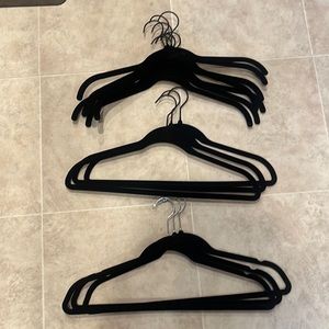 13 assorted black velvety covered hangers like new